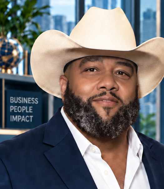 Ronald Jones wearing a cream cowboy hat and navy business suit